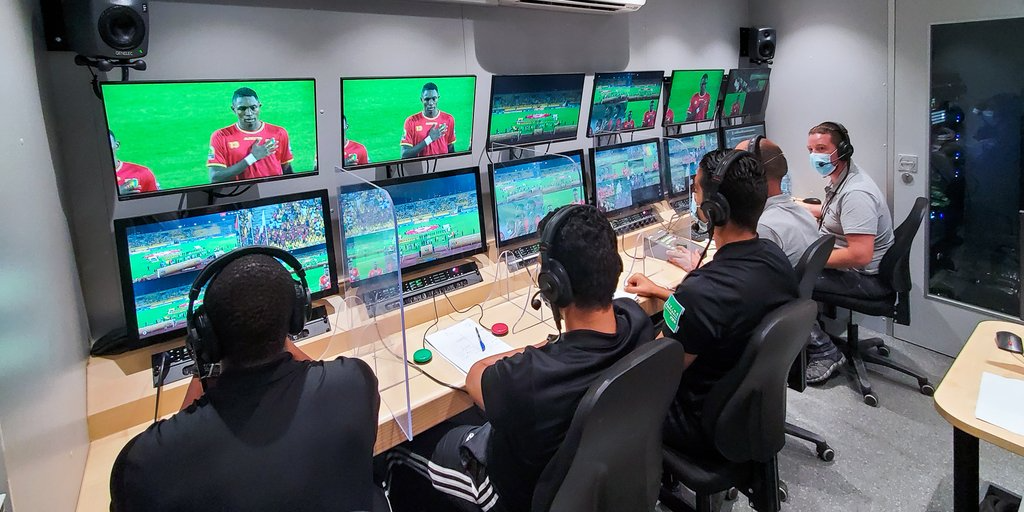 Picture of a group of people watching the VAR